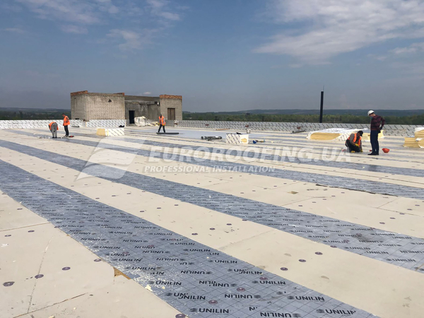 Flat roof installation Confectionery factory "Konti"