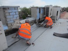 Влаштування мембранної покрівлі Острів
